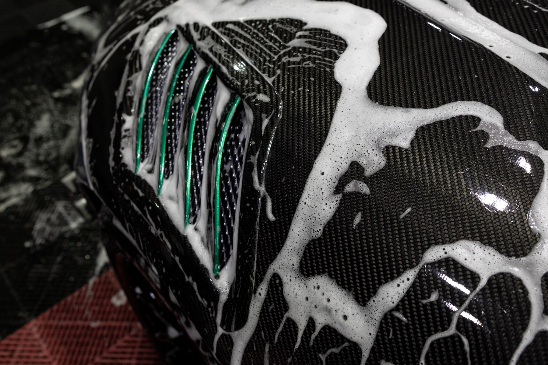 Detailing carbon fibre hood ahead of the show